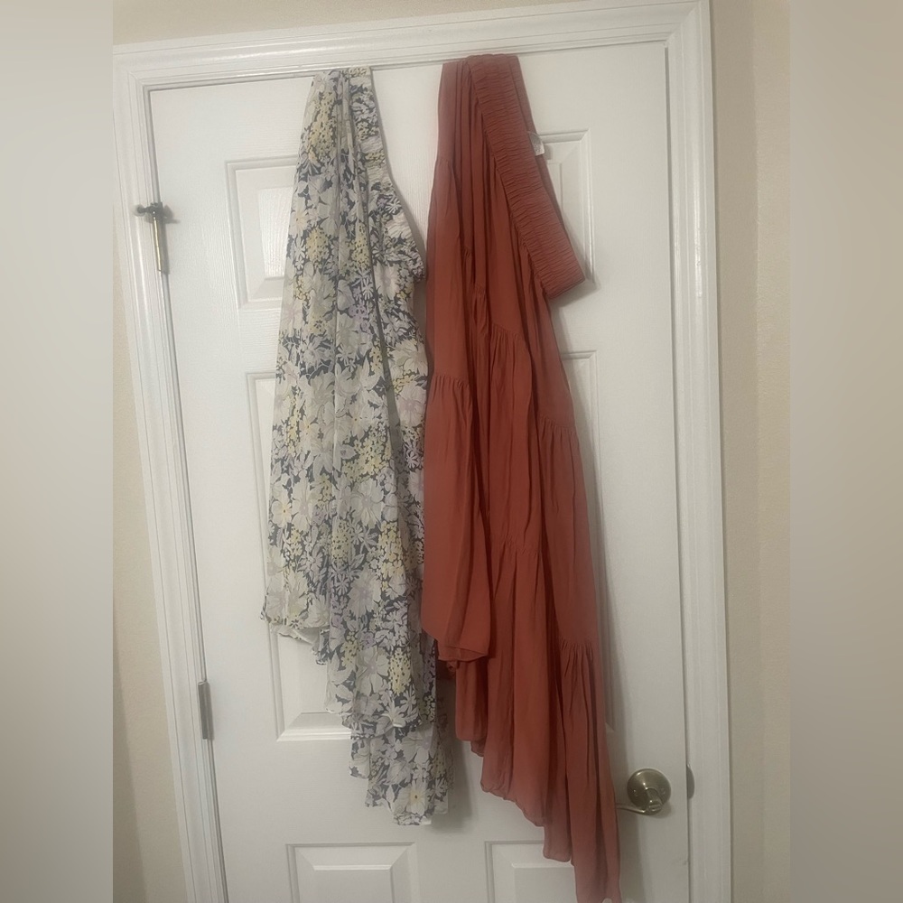 2 skirt set one with floral pattern and one all pink